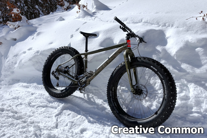 A fat bike resting on the snow